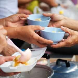 Giving Food To The Poor