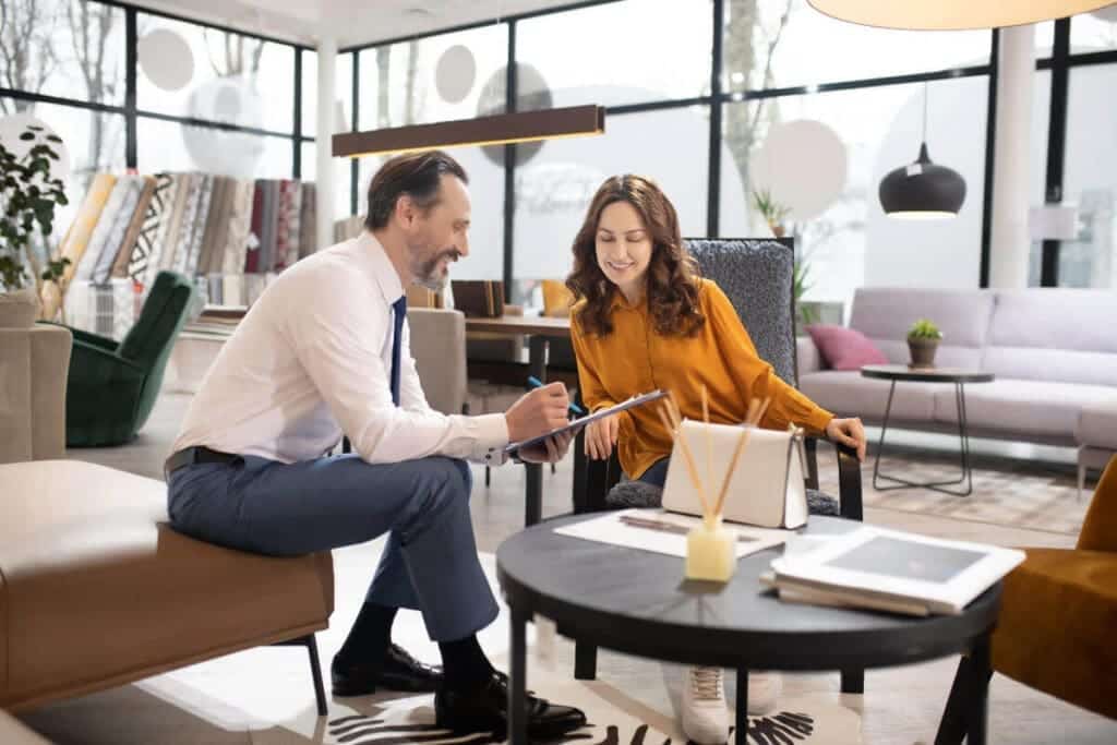 Two people talking about business